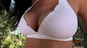 Busty beauty with long hair and a solo