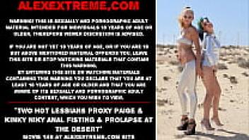 Two beautiful lesbians, Proxy Paige and Kinky Niky, anal fisting and prolapse in the desert.