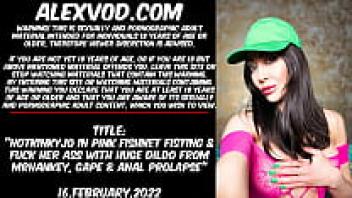 Hotkinkyjo in pink fishnet fisting and loves her ass with gigantic dildo from Mr. Hankey, gape, and anal prolapse.